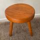 Tabouret tripode vintage en pin massif