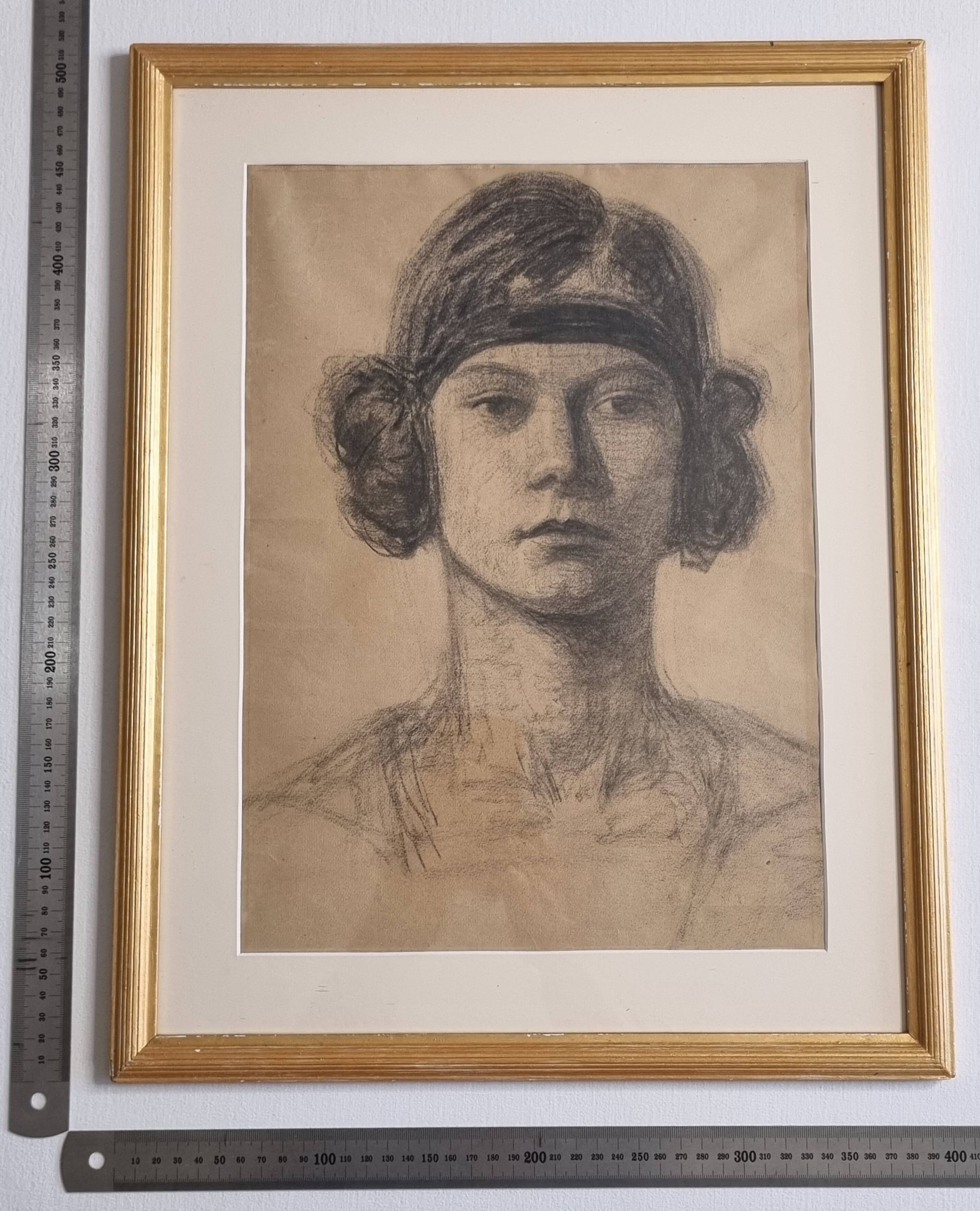 Female Art Deco portrait in charcoal, Paris circa 1921-1927, framed 40x51 cm.