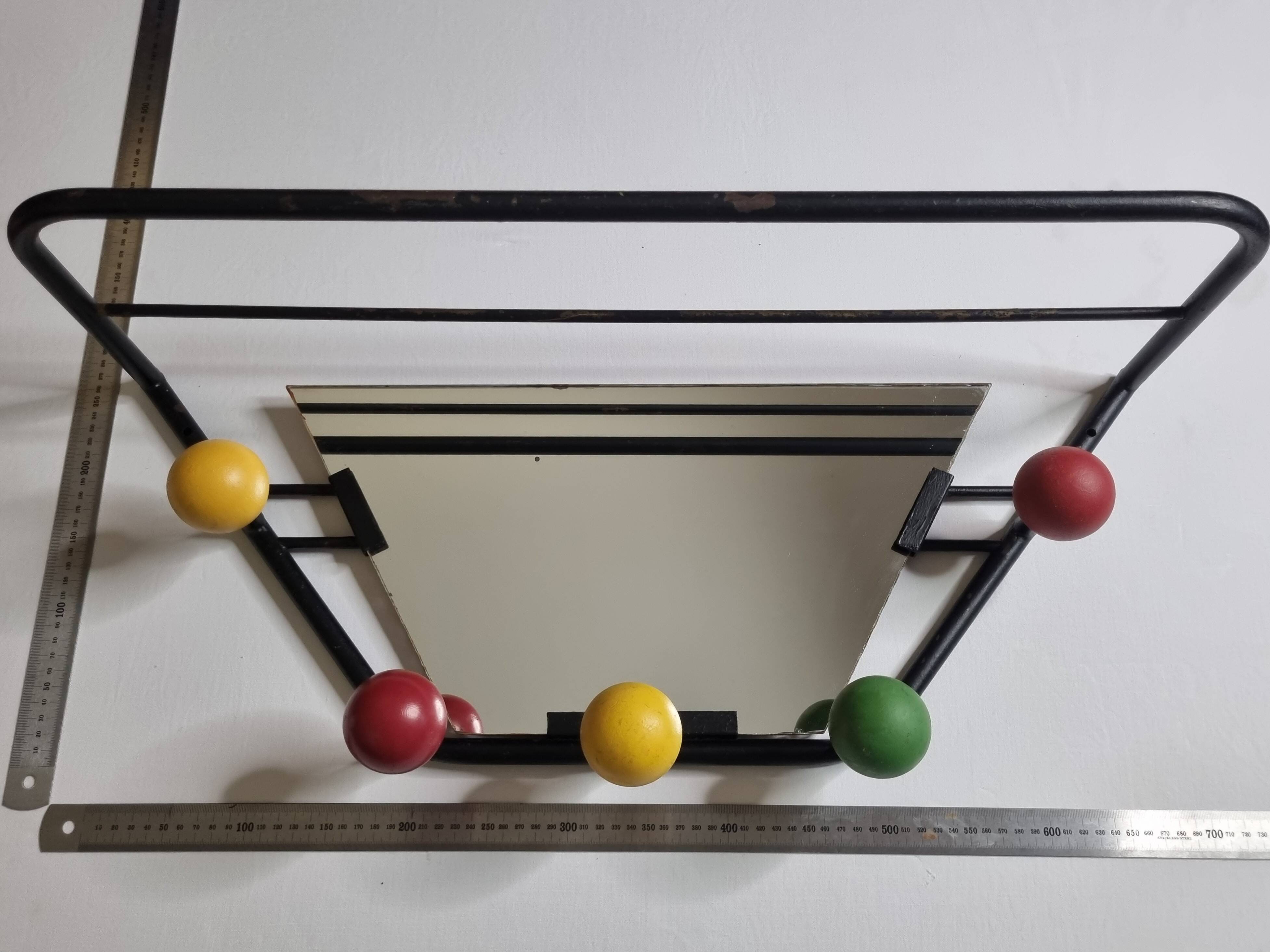 Wall-mounted coat rack with mirror, 5 hooks and hat holder from the 1950s-60s.