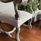Restored Louis XIII armchair – textured beige fabric