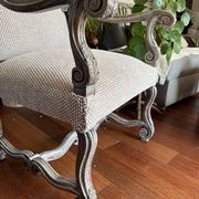 Restored Louis XIII armchair – textured beige fabric