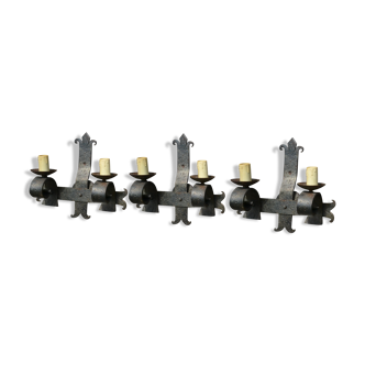 Three vintage hammered wrought iron sconces
