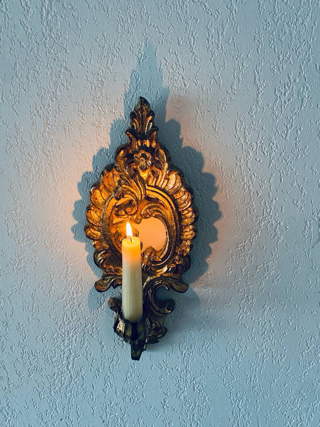 Gold wall candle holder