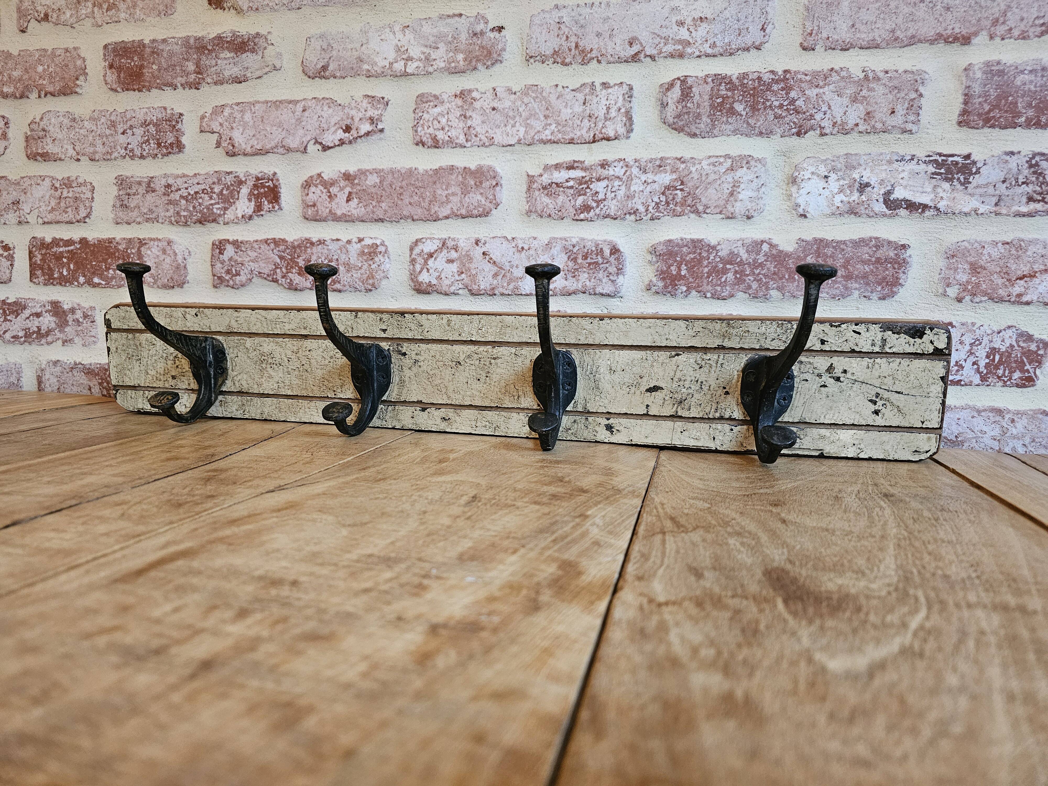 Solid teak coat hook with 4 double cast iron hooks