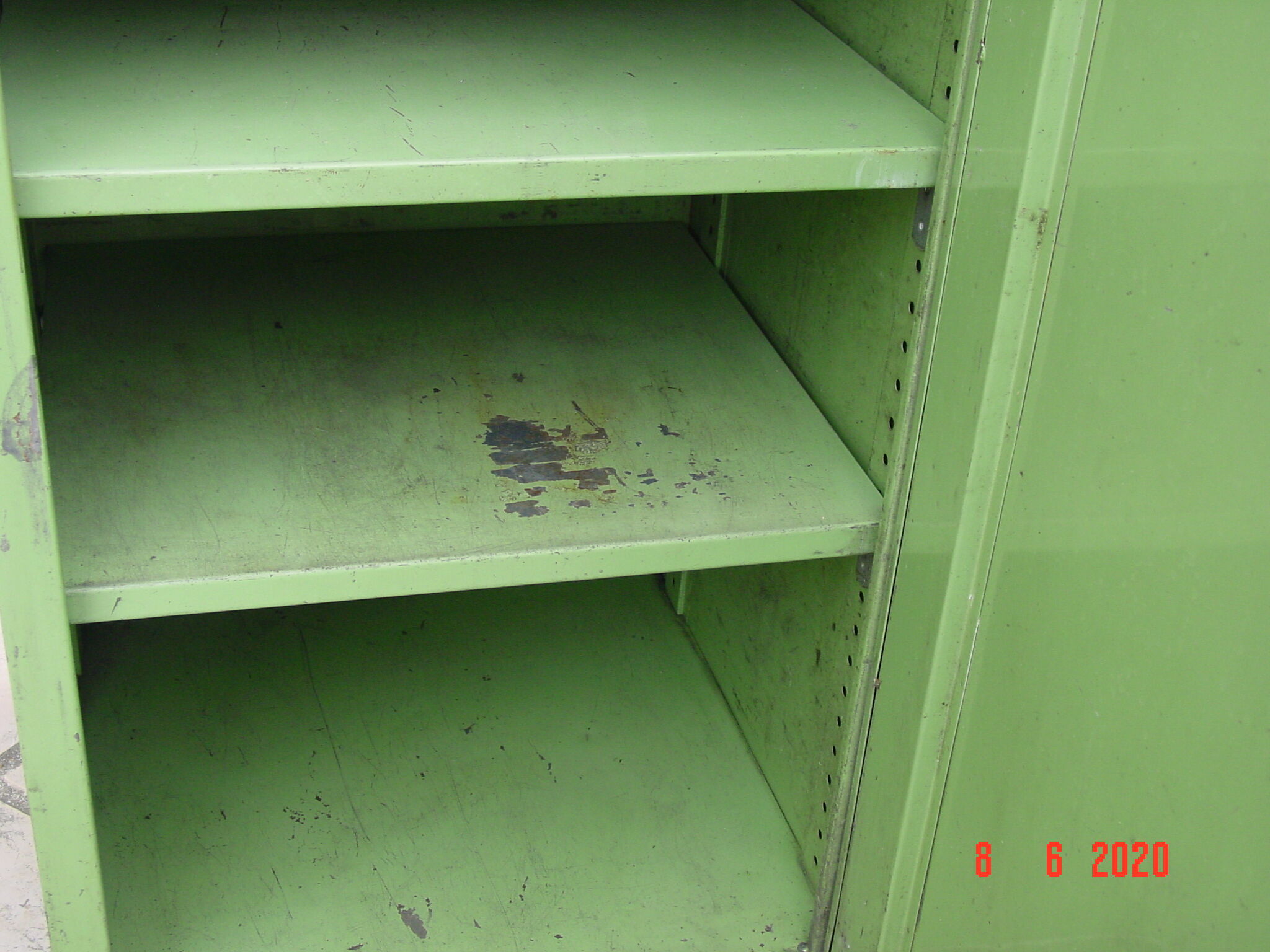 Green industrial metal cabinet