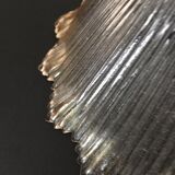 Transparent, slightly amber glass tulip. Vertical streaks.