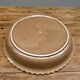 A trompe l’oeil strawberry pie dish