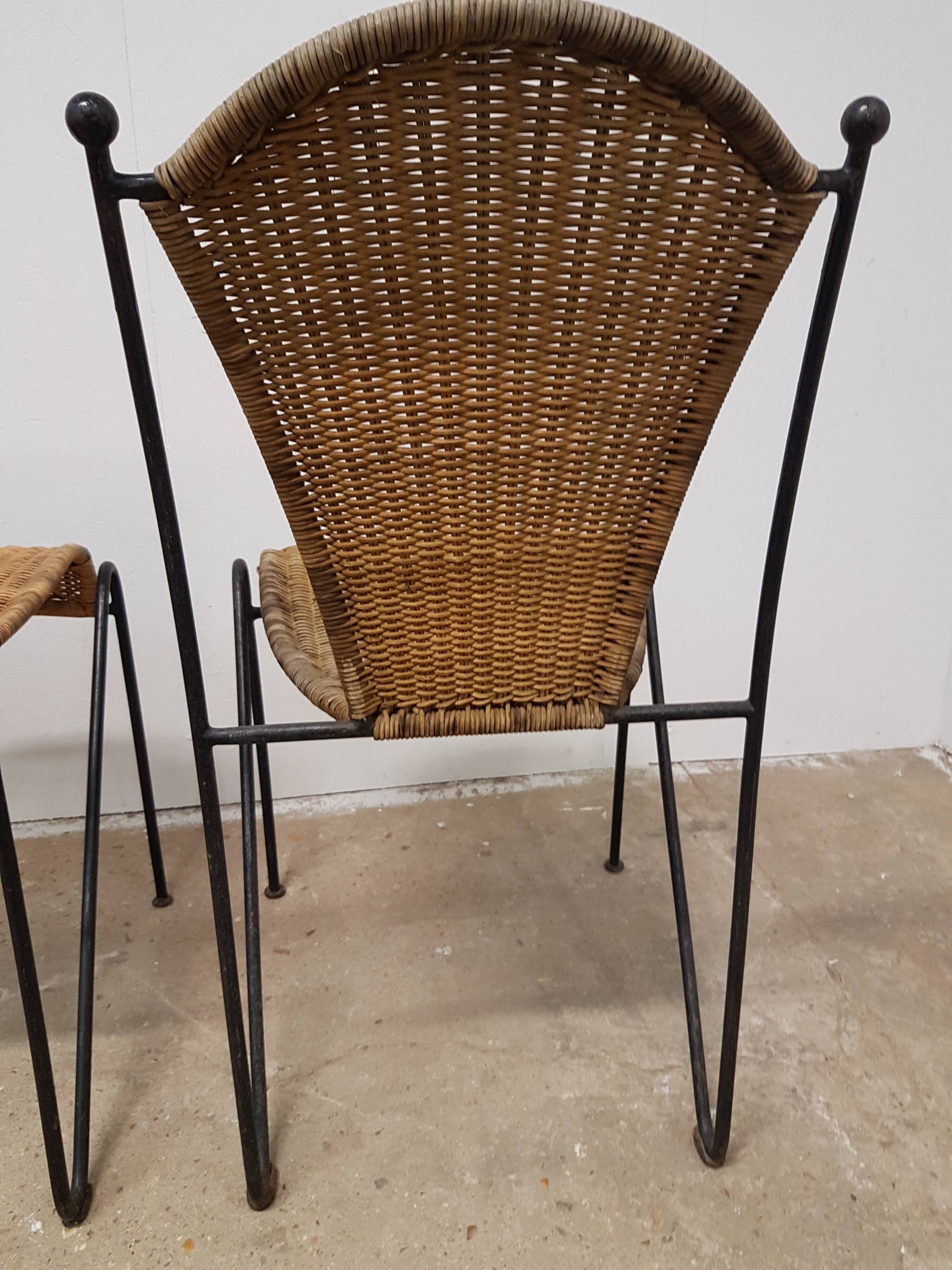 Vintage wicker and black steel chair