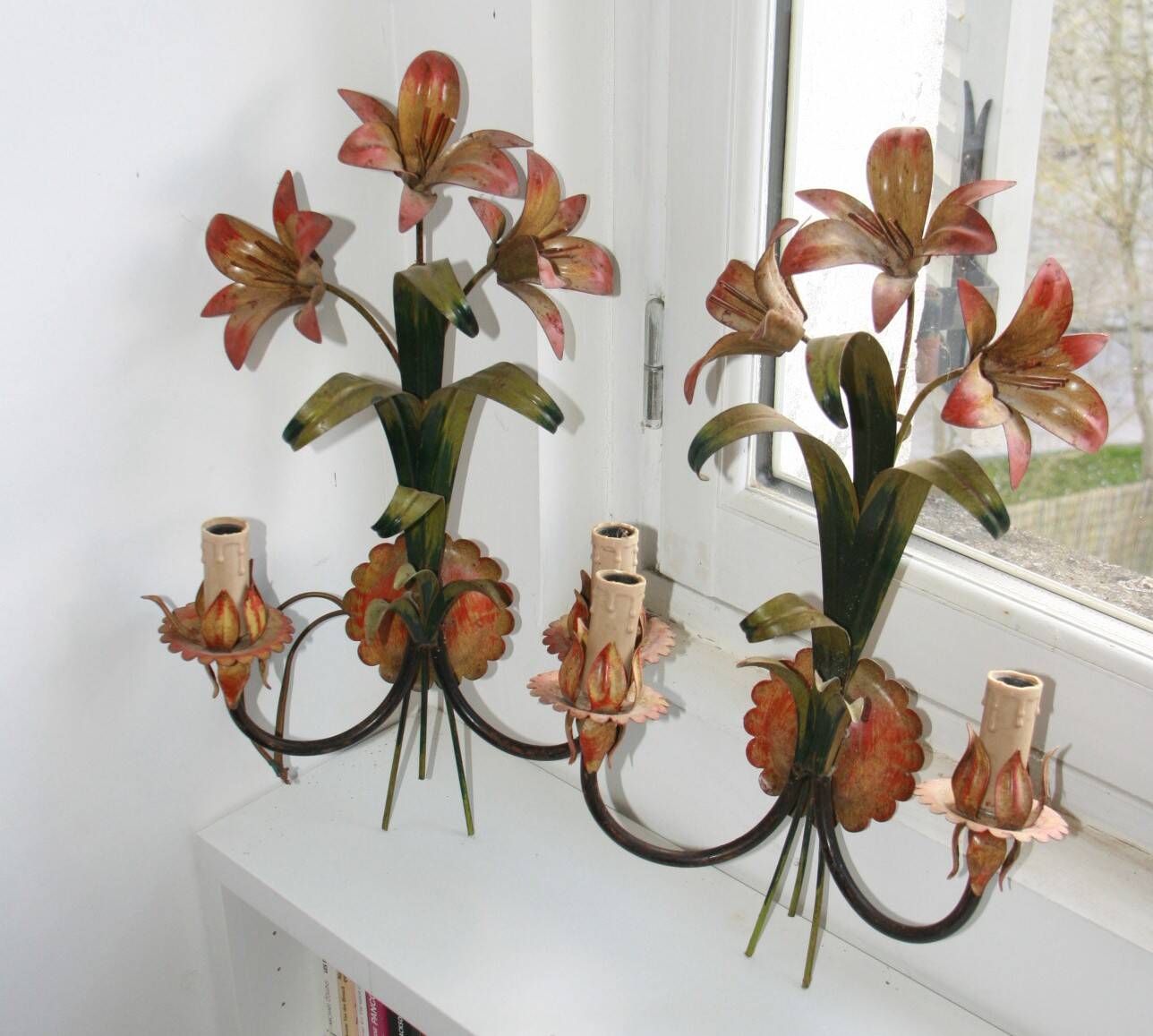 Pair of vintage floral wall sconces in Italian Florentine style metal.