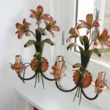 Pair of vintage floral wall sconces in Italian Florentine style metal.
