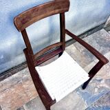 Scandinavian chair in wood and woven natural fibre.