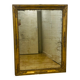 Antique mercury mirror with an Empire gold frame.