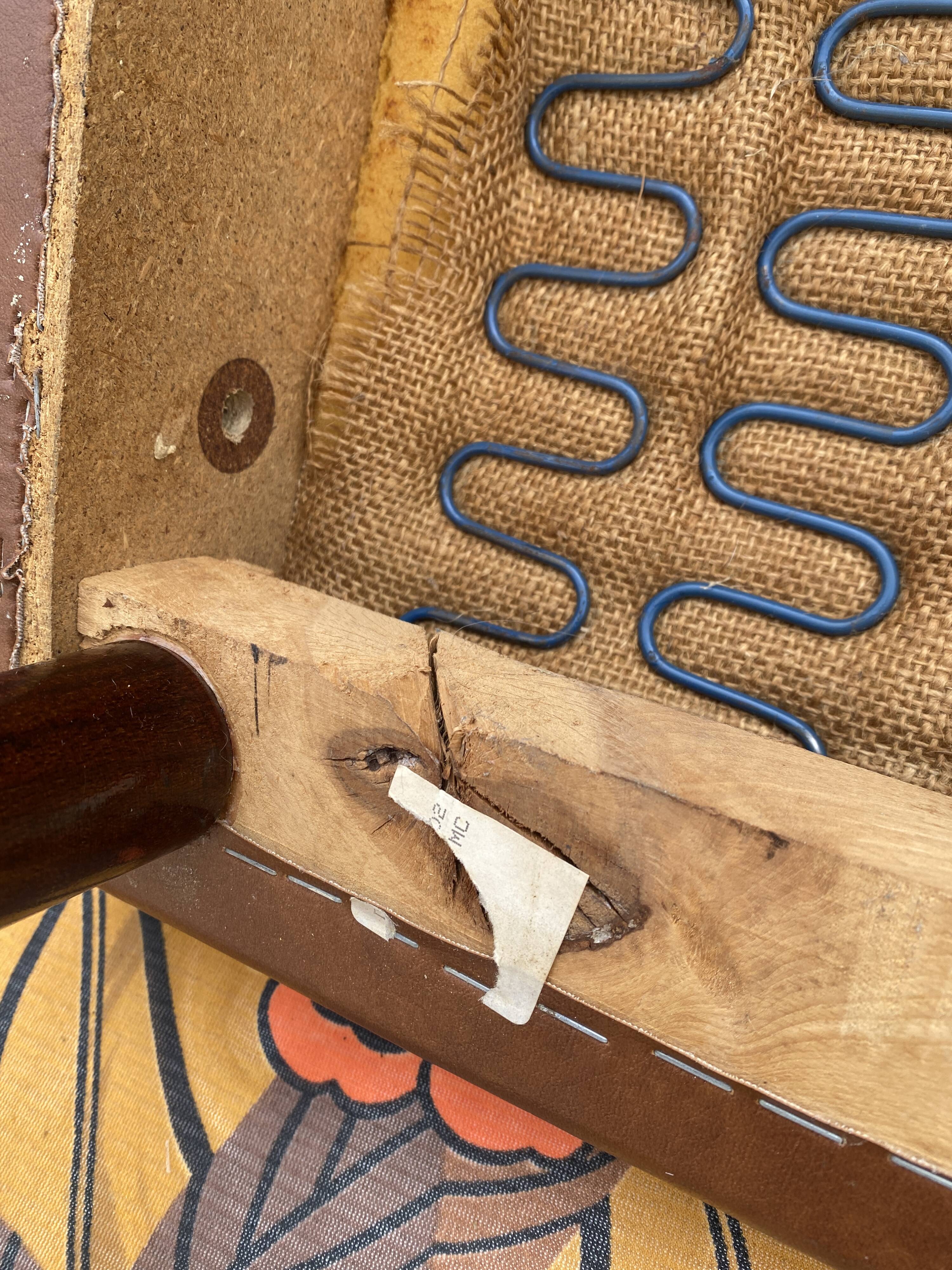 Mid-Century Scandinavian vintage retro armchair with oval armrests.