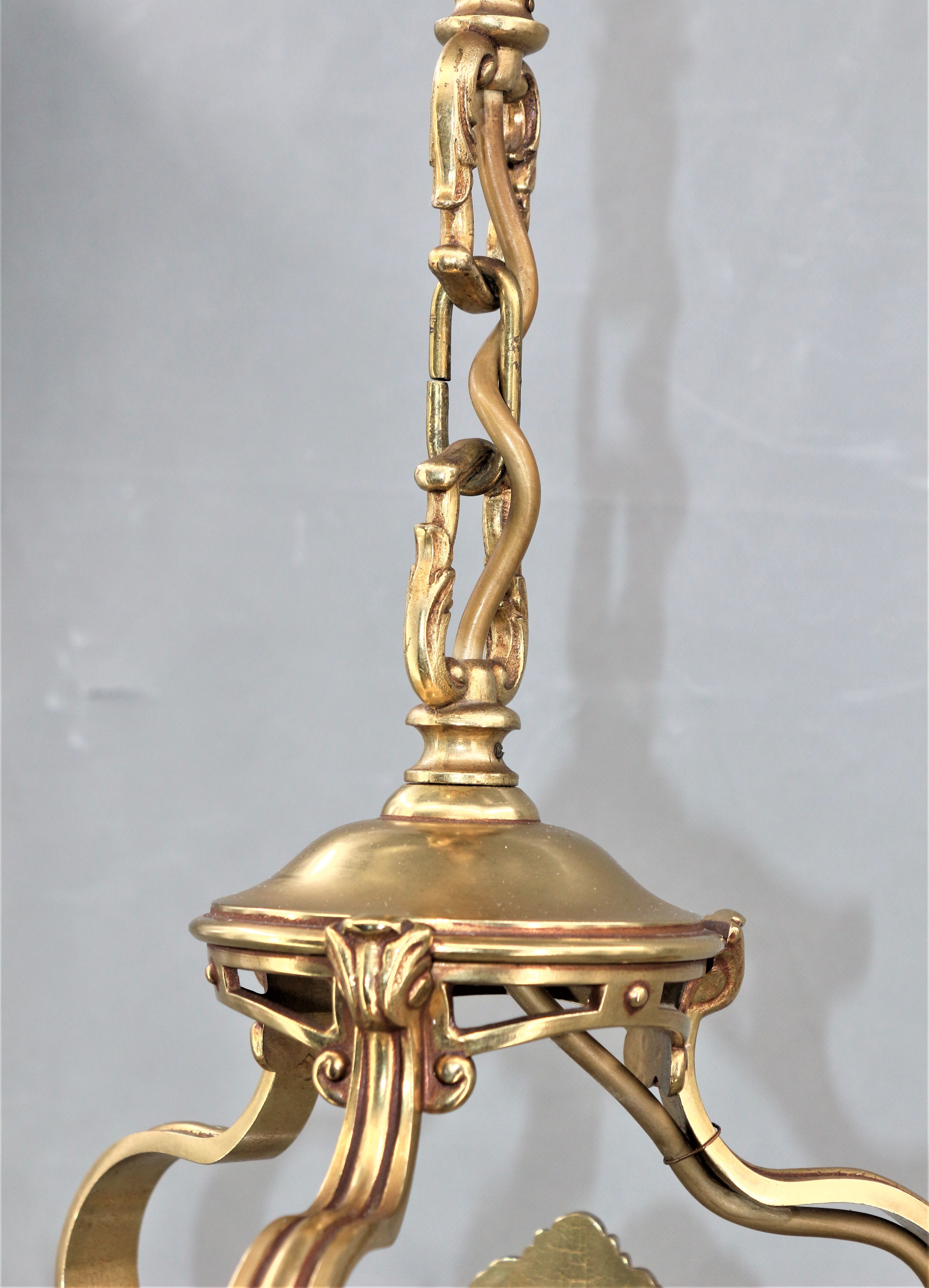 Lustre en bronze et verre bombé