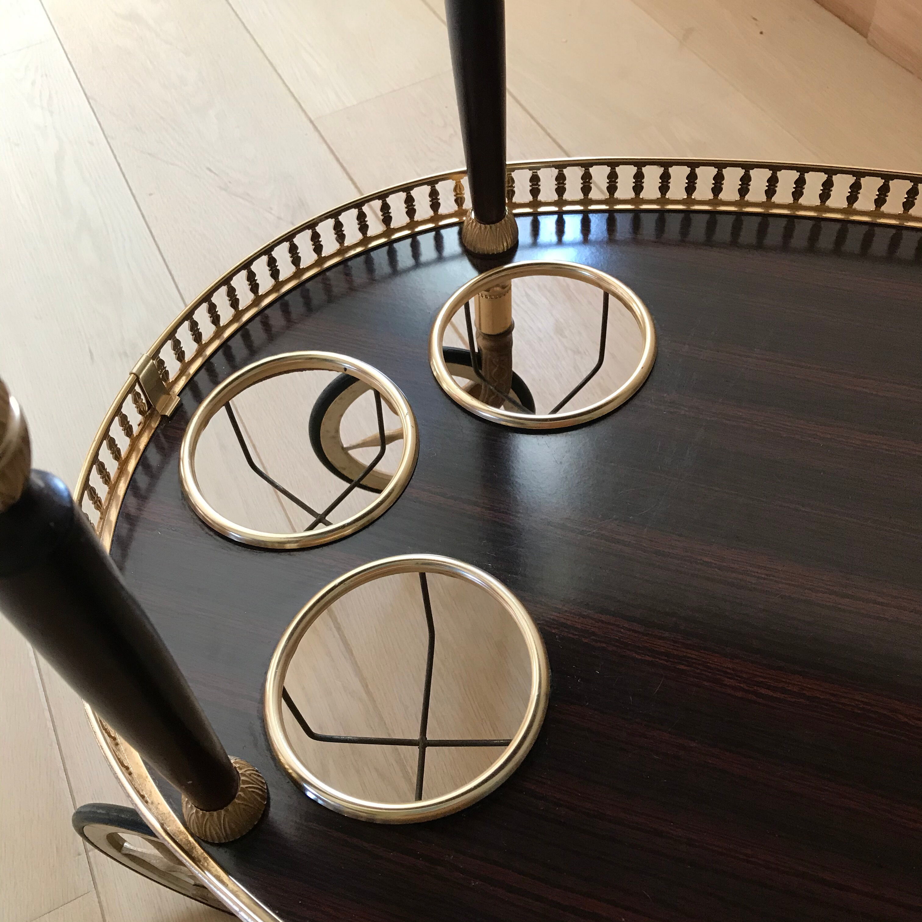 Golden wheeled serving trolley