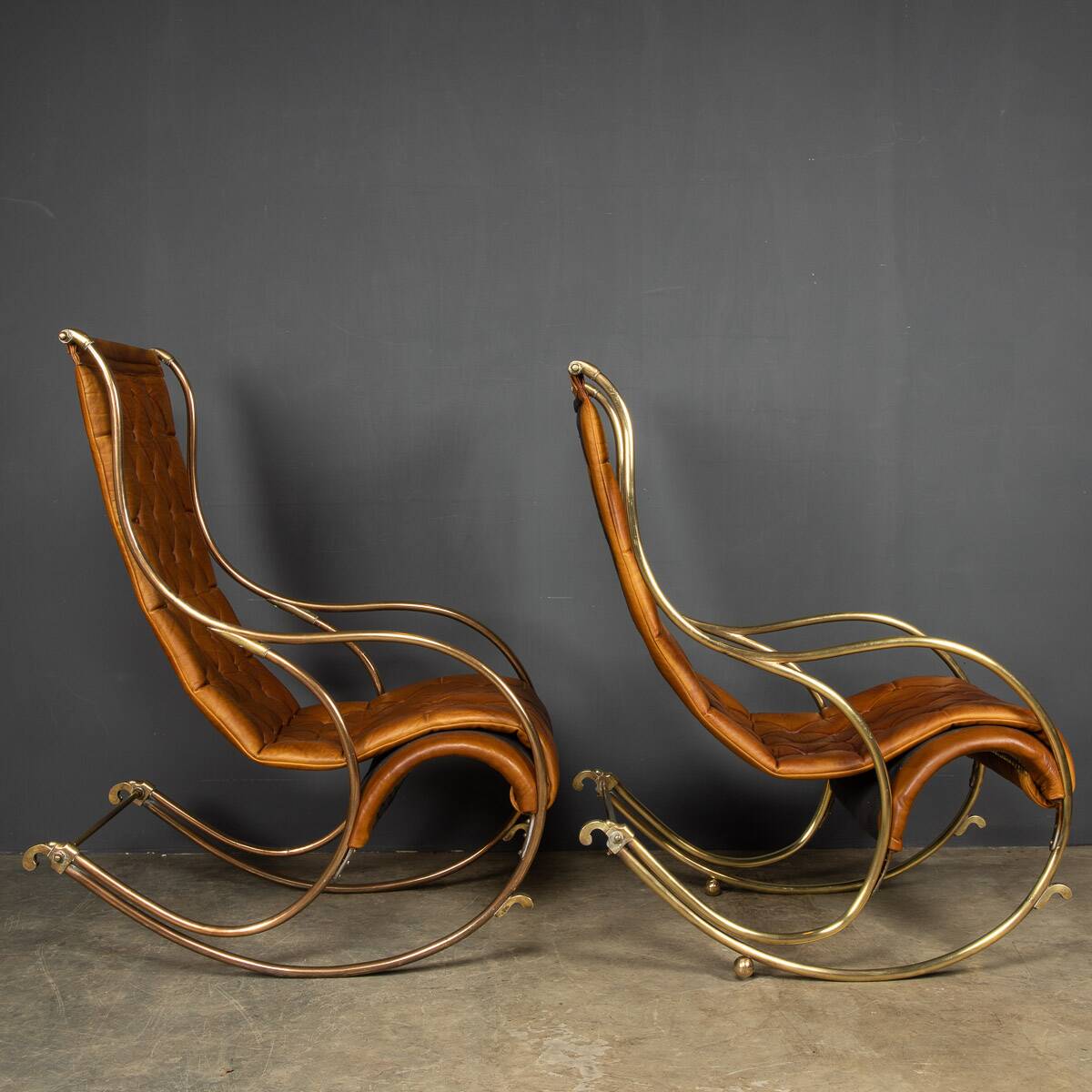 Mid 20thc british made pair of leather rocking chairs c.1950