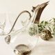 Ewer, decanter in silver-plated metal and glass