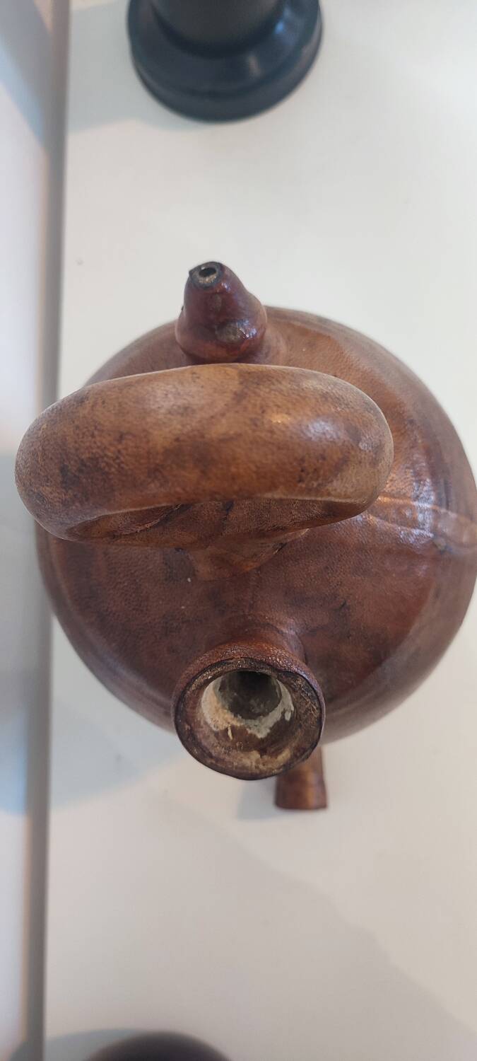 Gargoulette, terracotta jug covered with leather