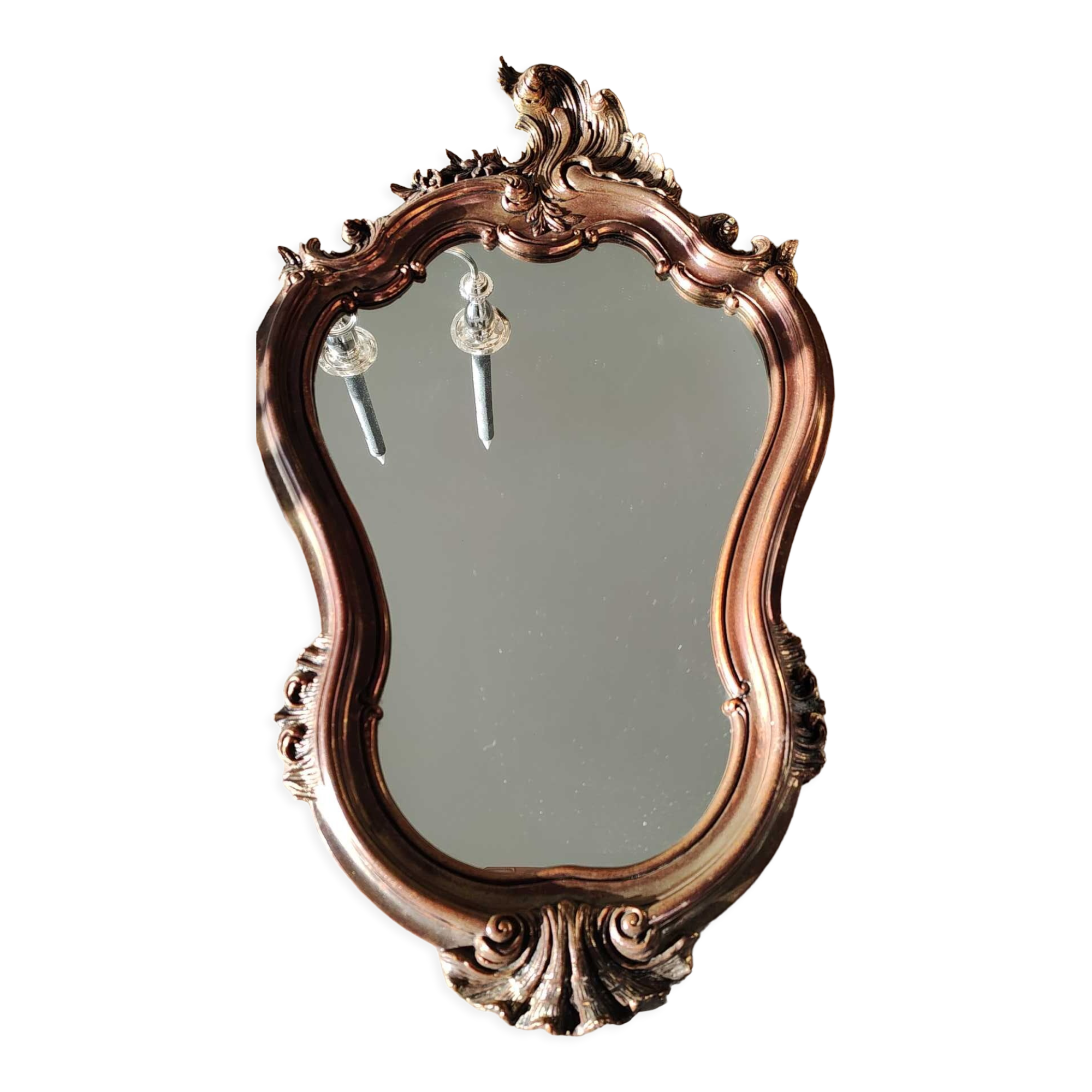 Pretty Baroque style mirror / Louis XV patinated with pink / golden copper reflections. Volutes, leafy shells