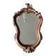 Pretty Baroque style mirror / Louis XV patinated with pink / golden copper reflections. Volutes, leafy shells