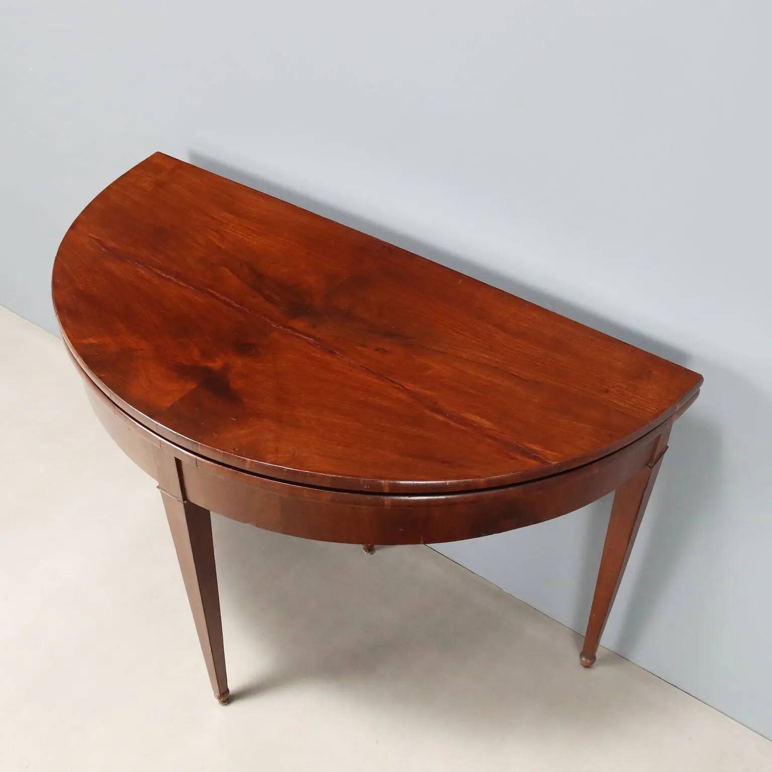 Antique demi-lune console in mahogany with a folding top, 19th century.