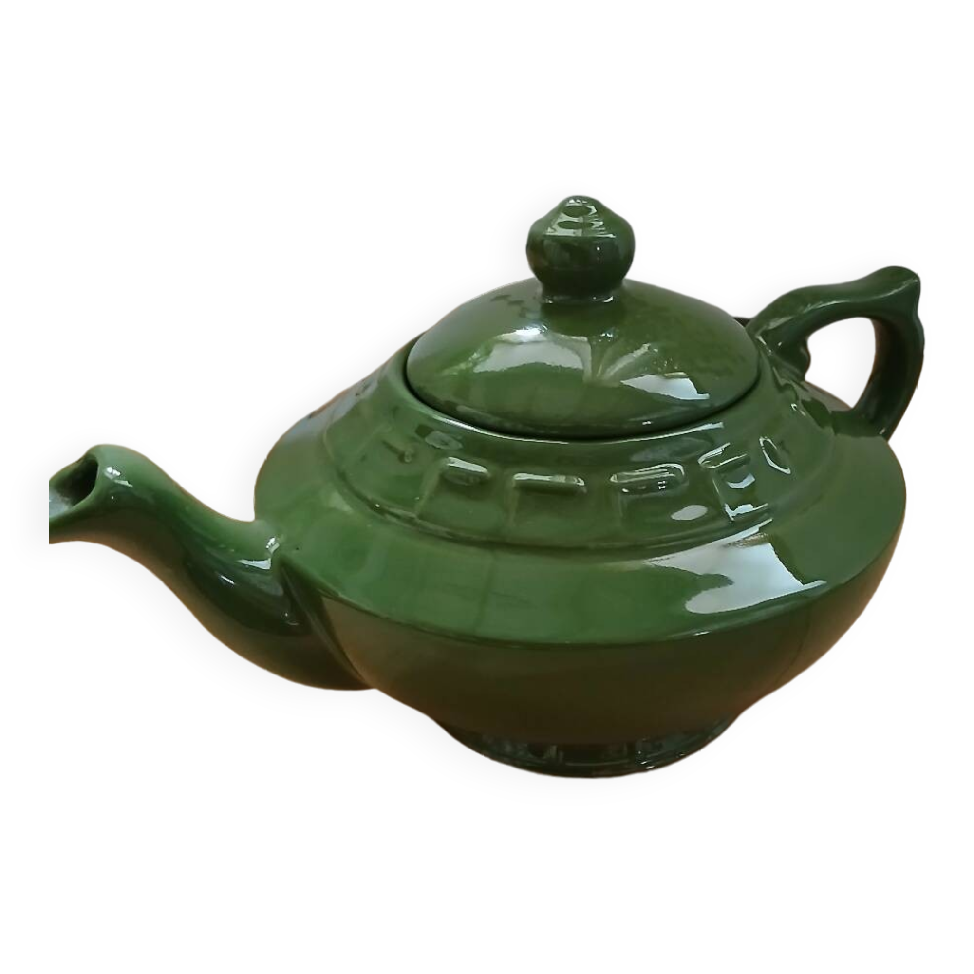 Green earthenware teapot