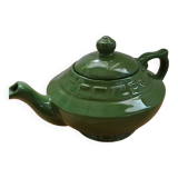 Green earthenware teapot