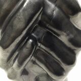 Vase with intertwined hands