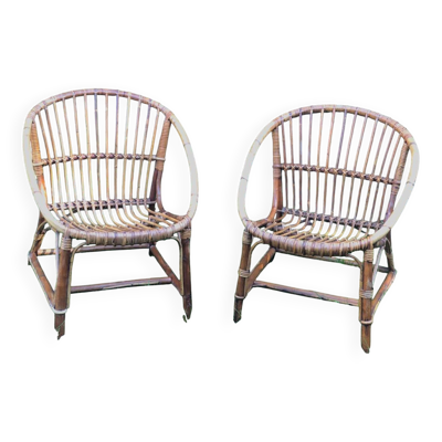 Paire de fauteuils coquille en rotin 1960