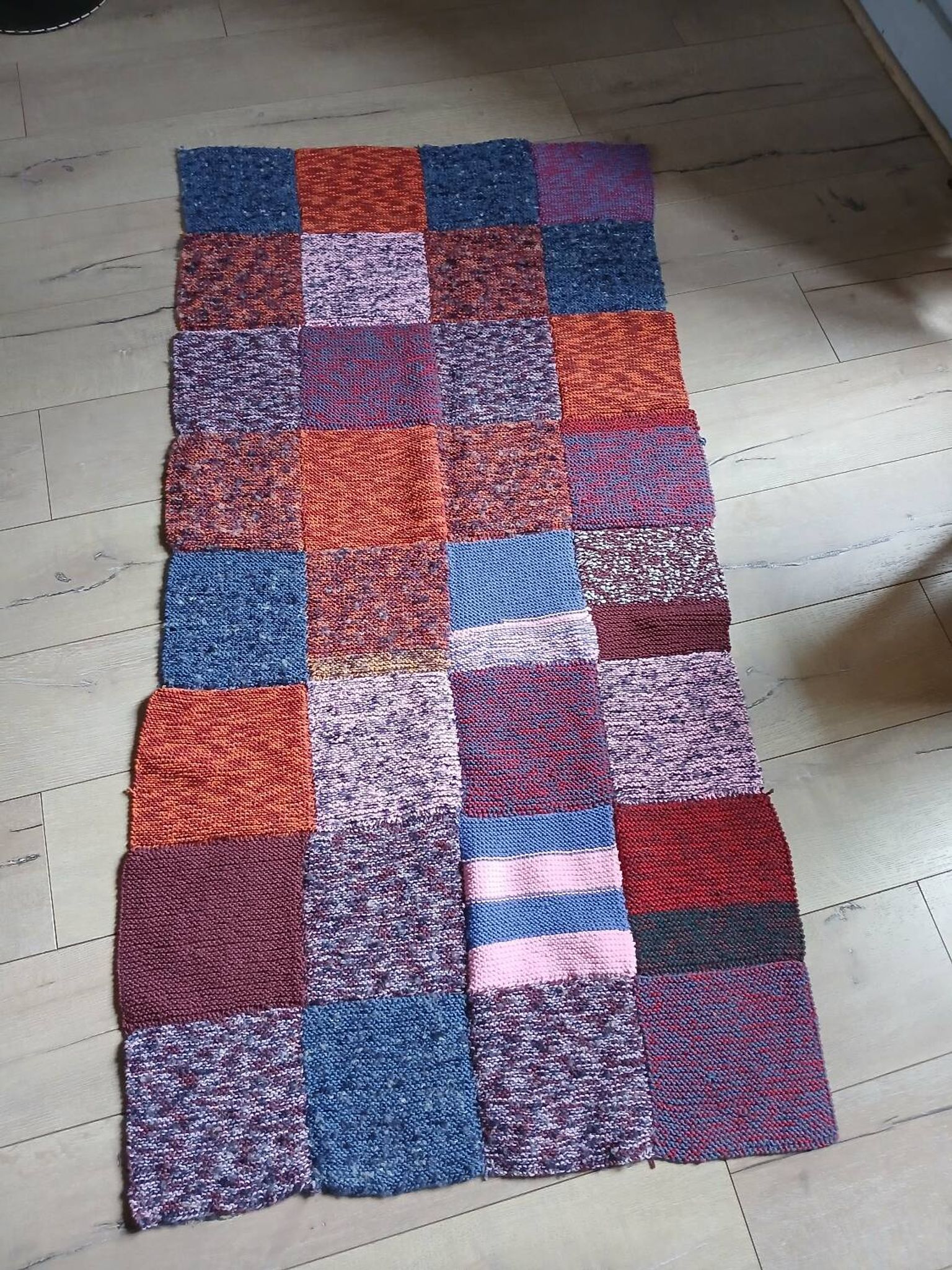 Plaid en patchwork tricoté main