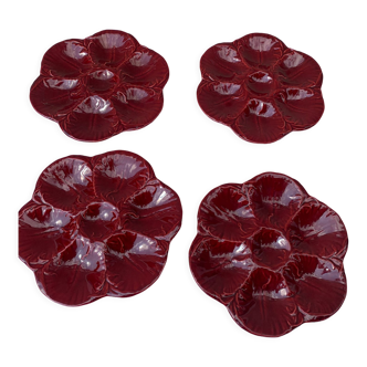 4 oyster plates in vintage red glazed ceramic slip and collector