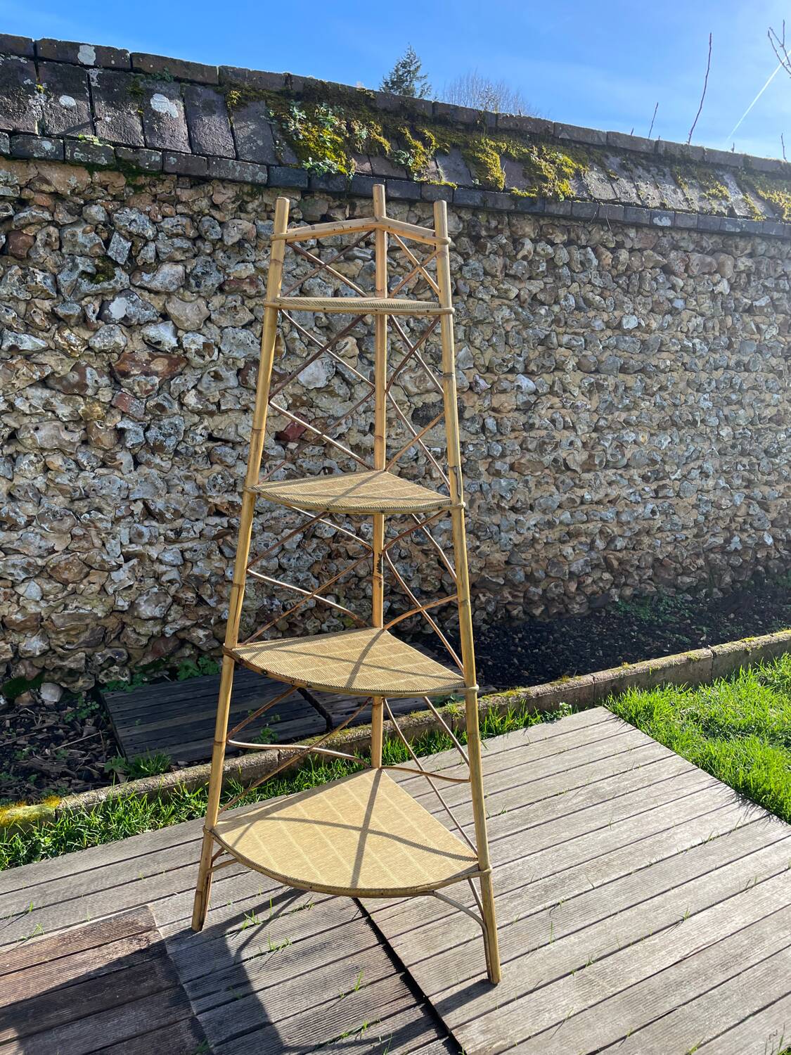 Audoux Minnet style corner shelf in vintage rattan 1950
