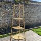 Audoux Minnet style corner shelf in vintage rattan 1950