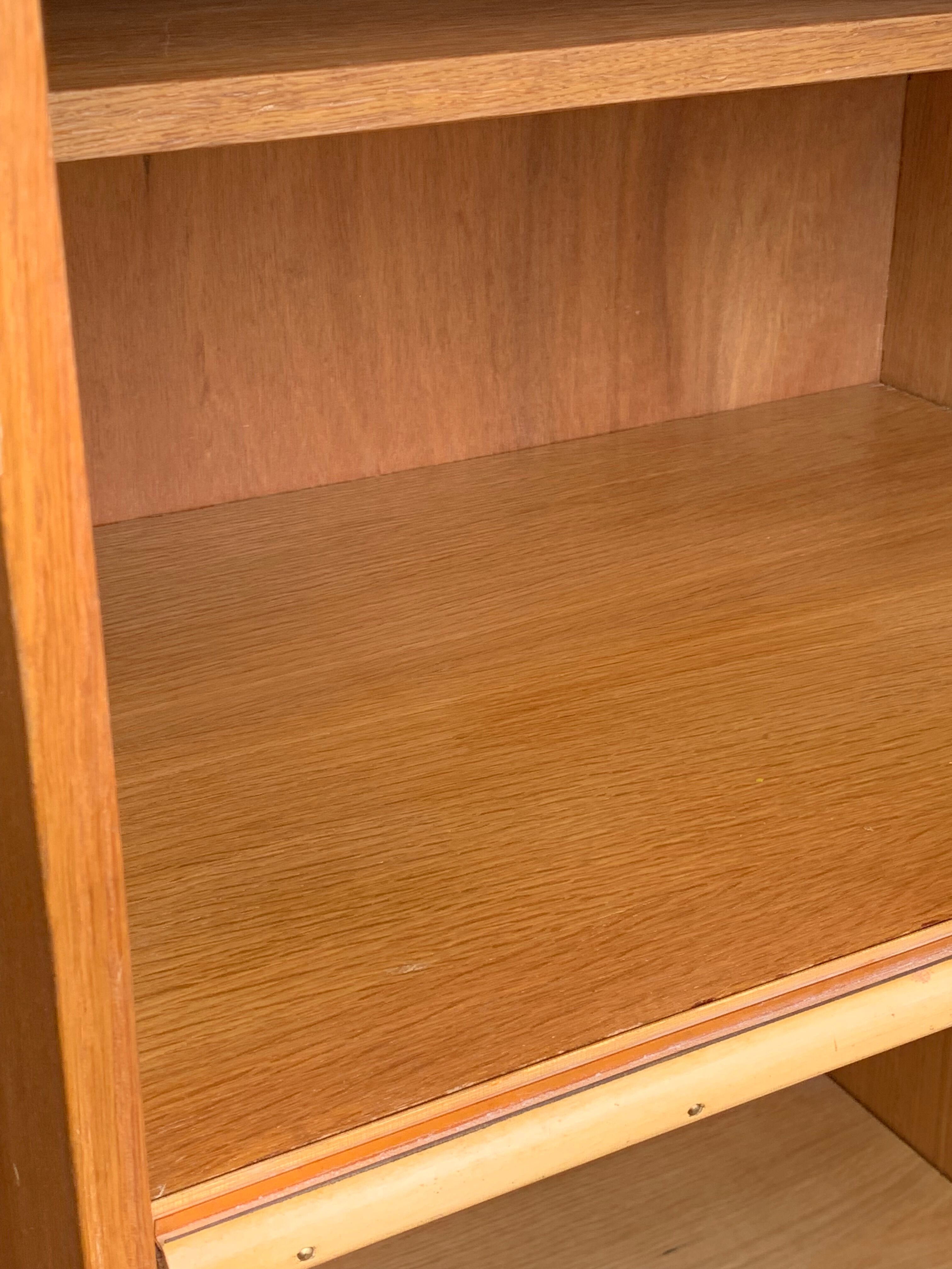 Rattan wardrobe with tapered legs from the 1960s.