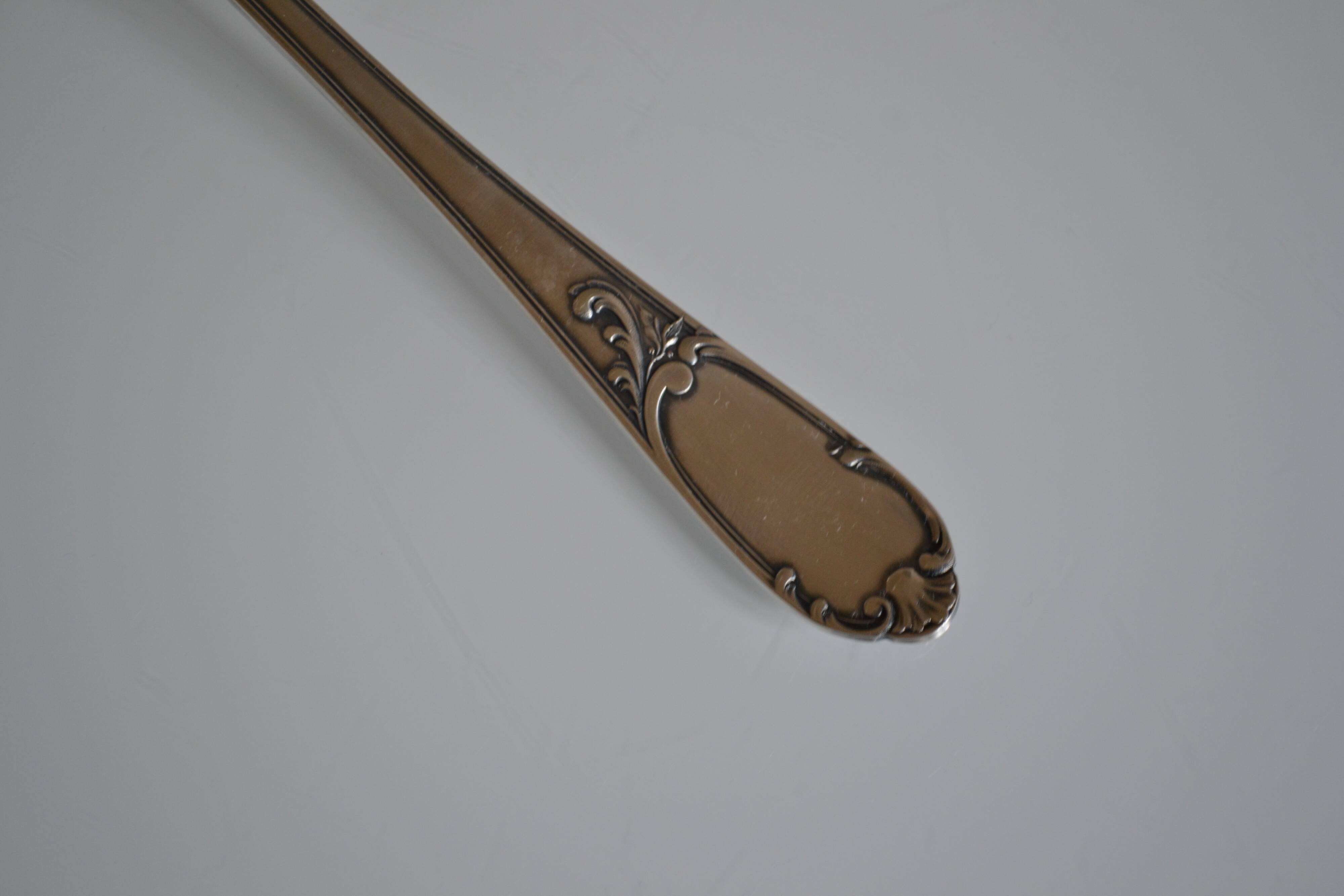 Silver metal ladle goldsmith frionnet francois