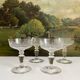 4 coupes à champagne anciennes en cristal gravé entrelacs