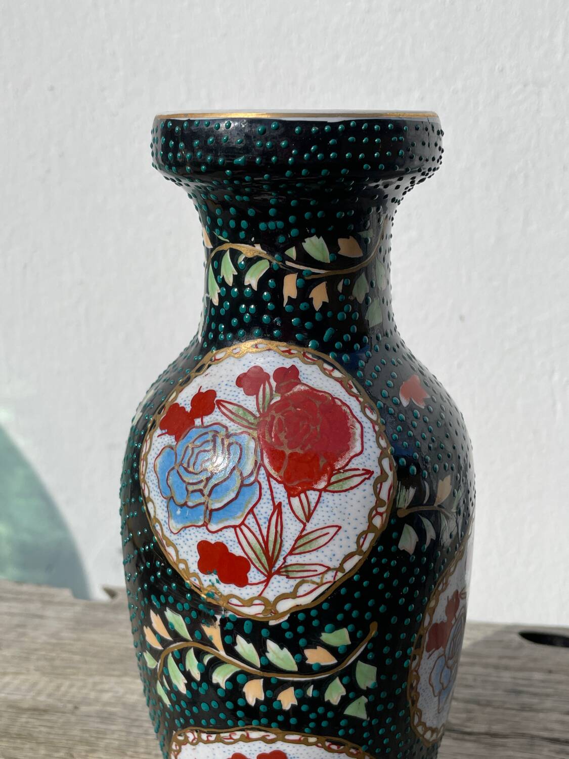 Asian vase in black ceramic with floral decoration
