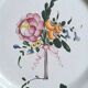 Hand-painted earthenware plate from eastern France, 18th century.