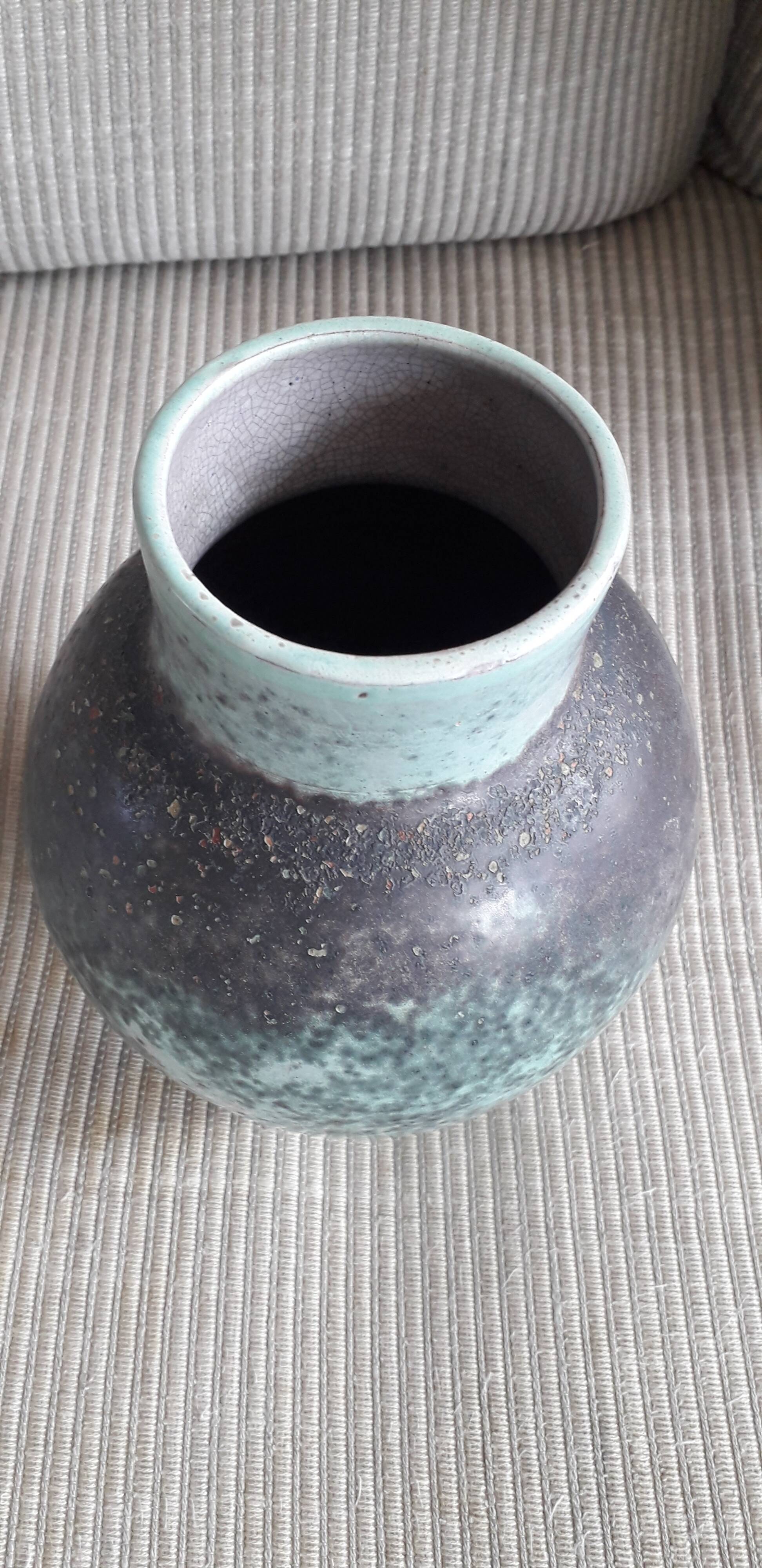 Vintage turquoise vase signed