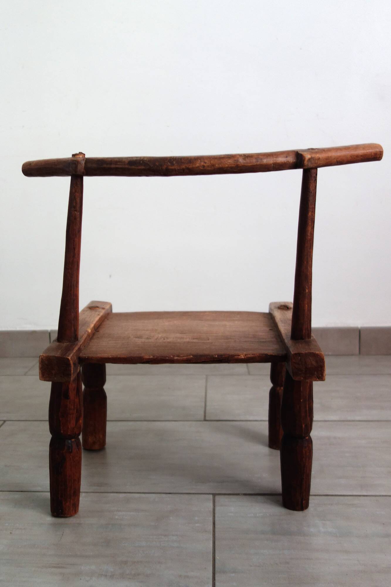 Antique brutalist Baoulé African chair