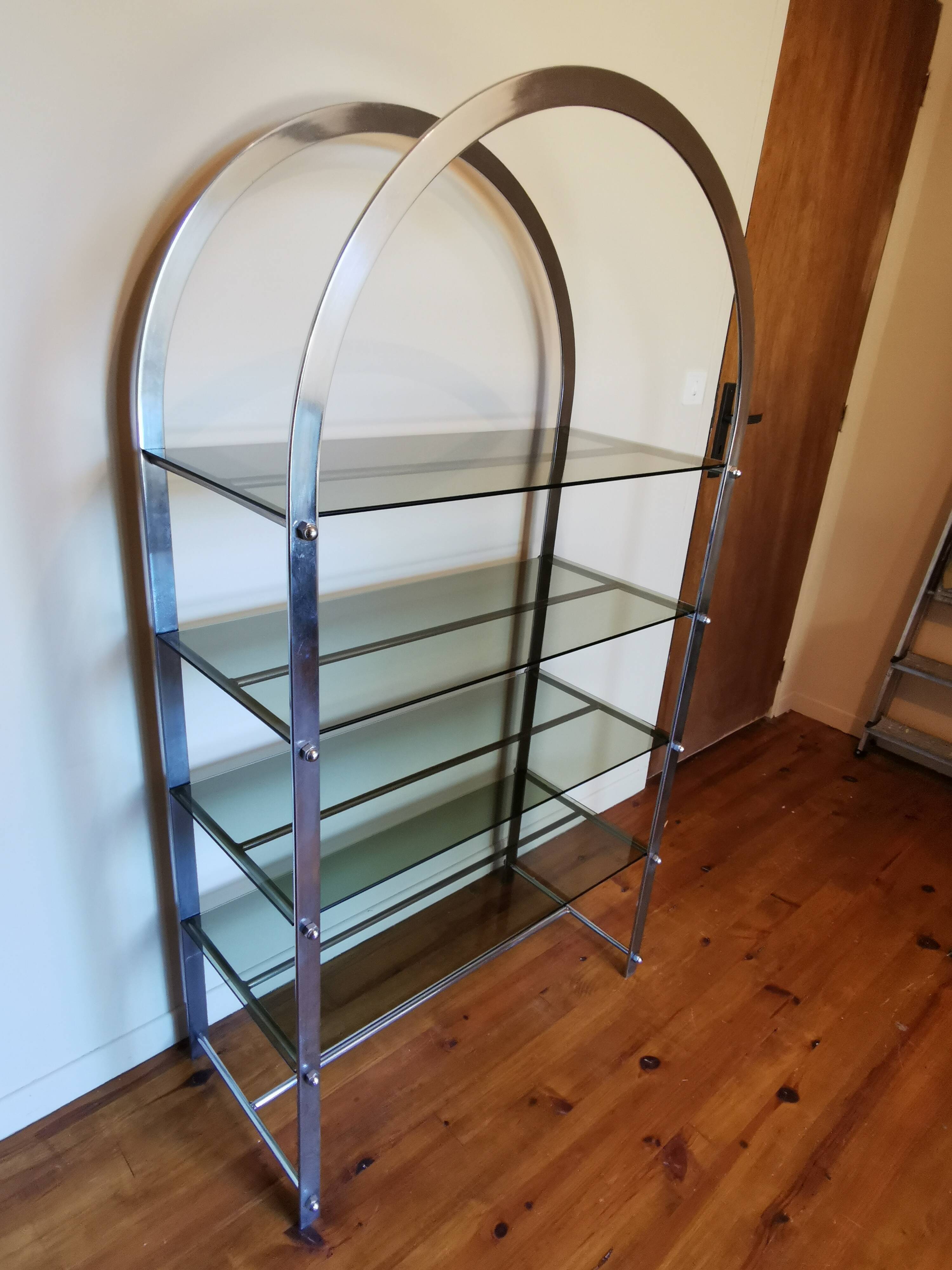 Rounded shelf from the 70s in chrome metal and glass