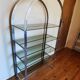 Rounded shelf from the 70s in chrome metal and glass