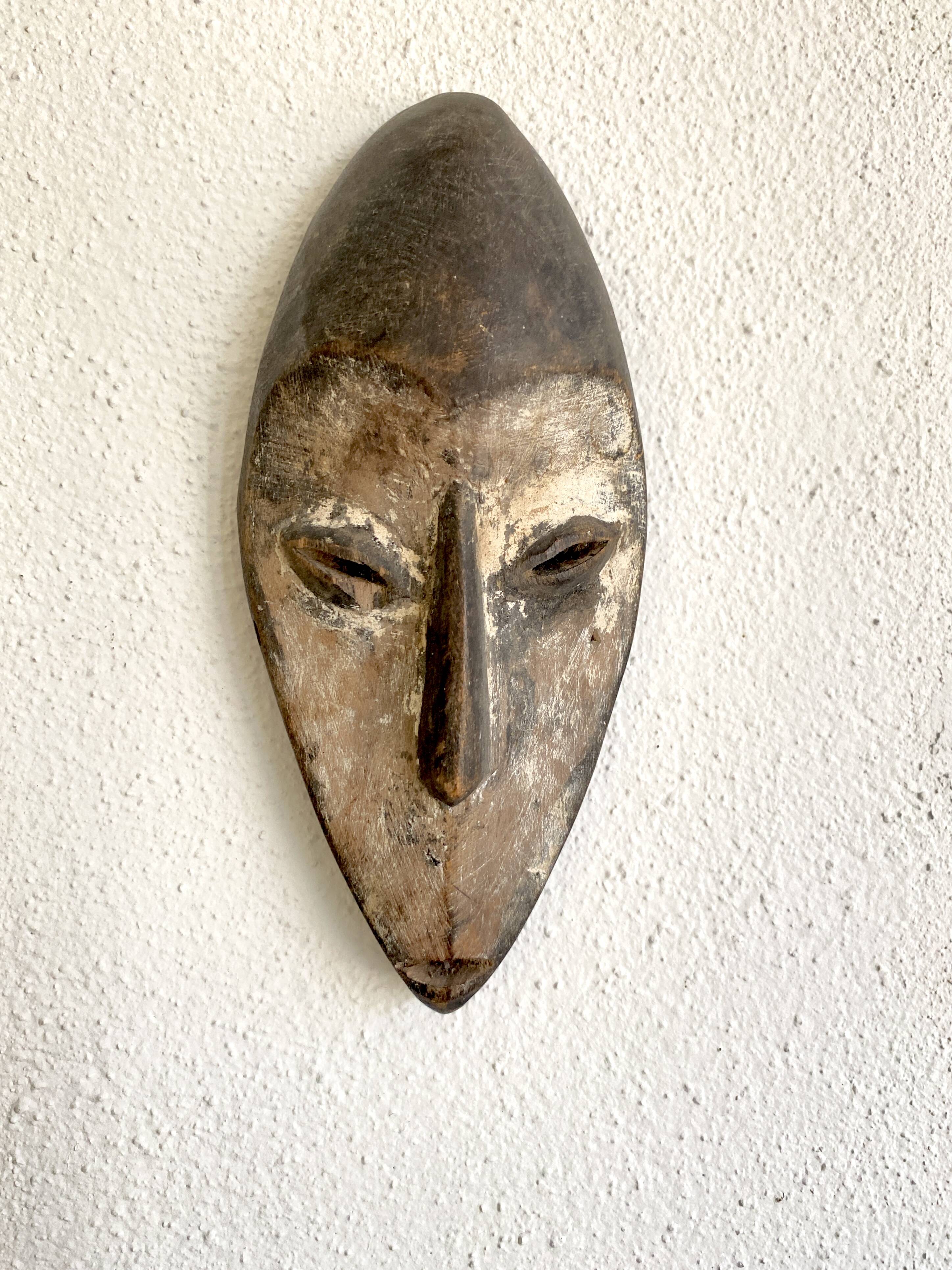 African mask, Fang tribe, wood and kaolin