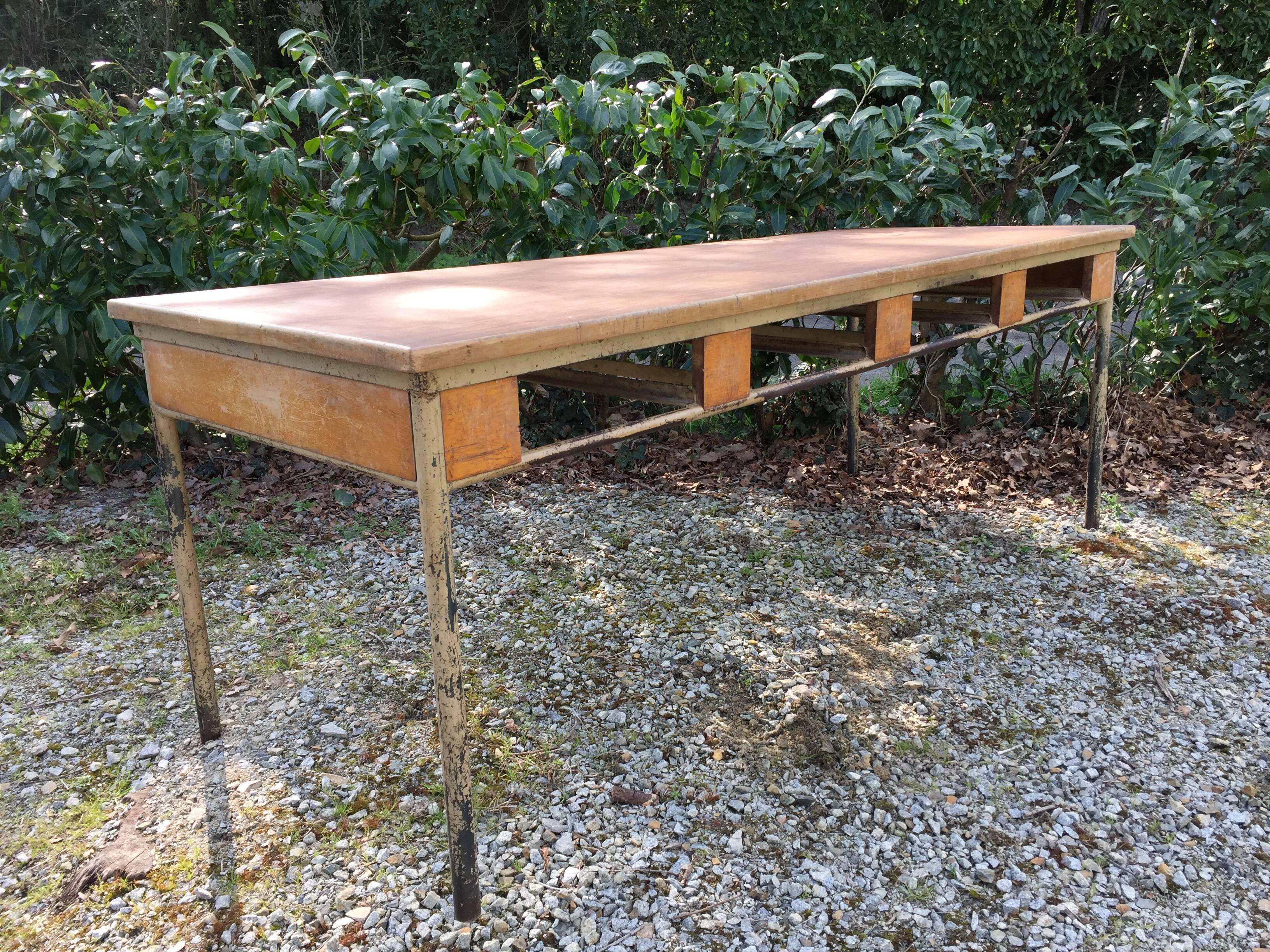 Vintage modernist table with metal tubular base