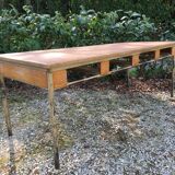 Vintage modernist table with metal tubular base