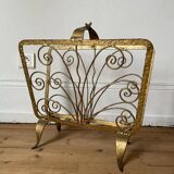 Vintage wrought iron magazine rack with gold butterfly design