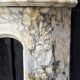 Louis XV style fireplace in purple breccia marble, circa 1880.