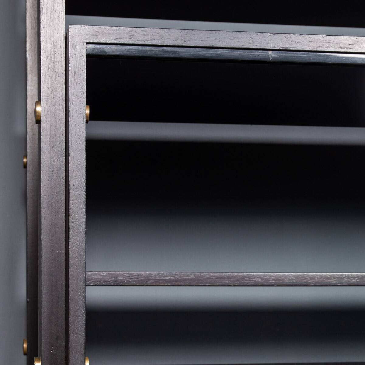 Striking 20thc italian ebonised etageres with open back & storage c.1970