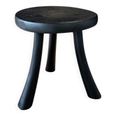 Small black wooden tripod stool