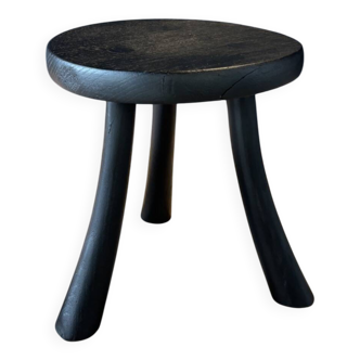 Small black wooden tripod stool